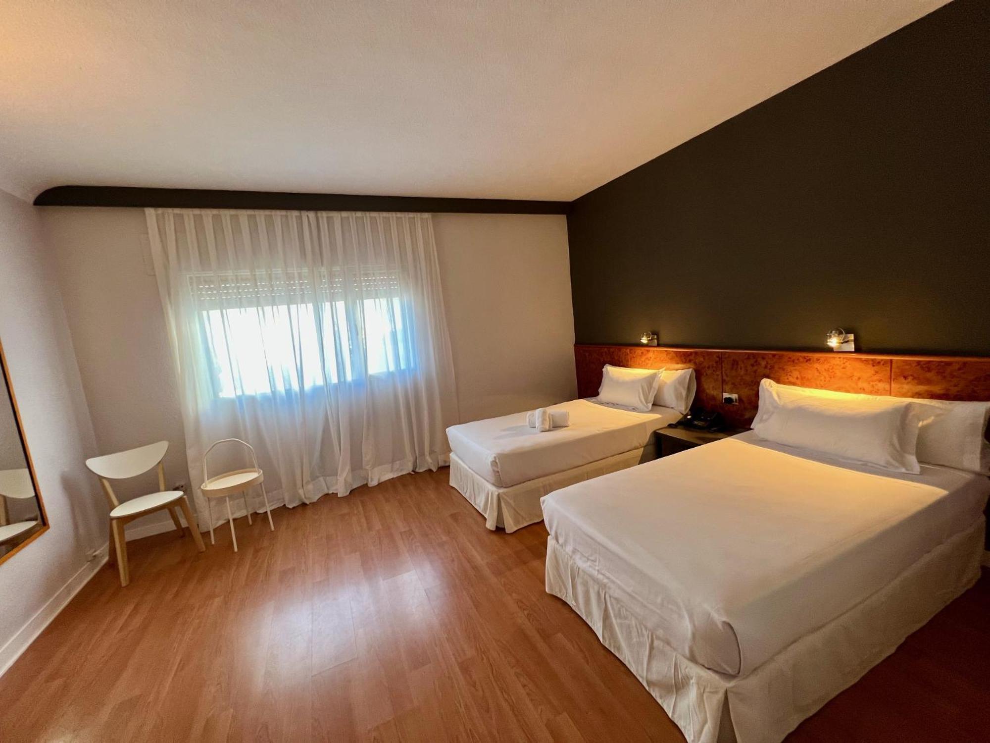 Habitación Familiar Triple - 2 camas